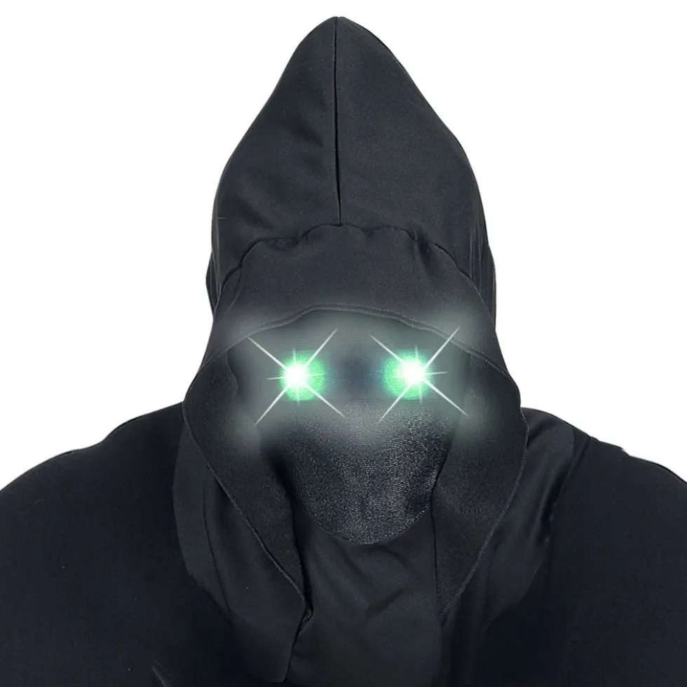 Ansigtsløs Maske med Lysende Grønne Øjne